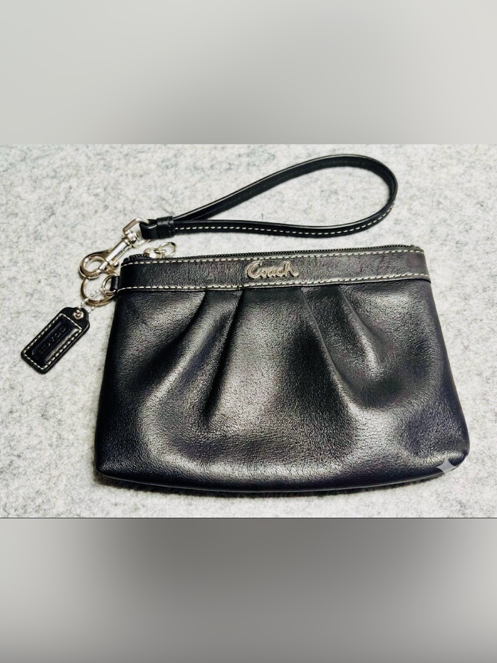 Coach Black Leather Pleated Wristlet with Logo Charm 7” x 5” approximately